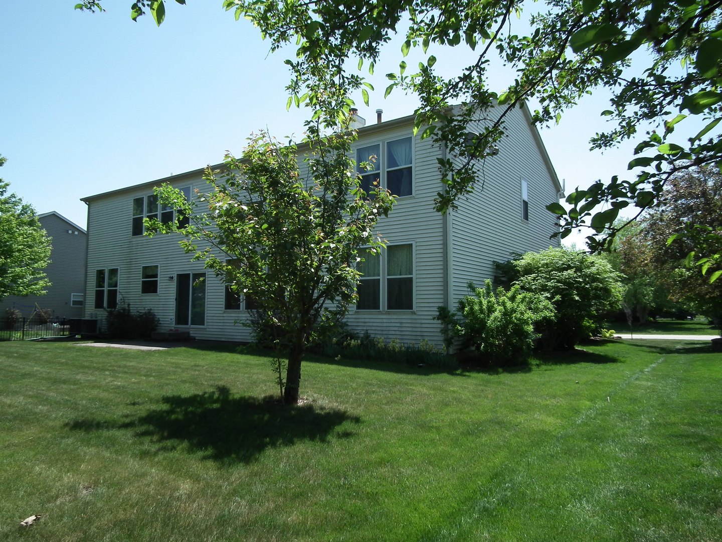 24632 Apollo Drive Plainfield, IL 60585 - Photo 22 of 22 a front view of a house with garden