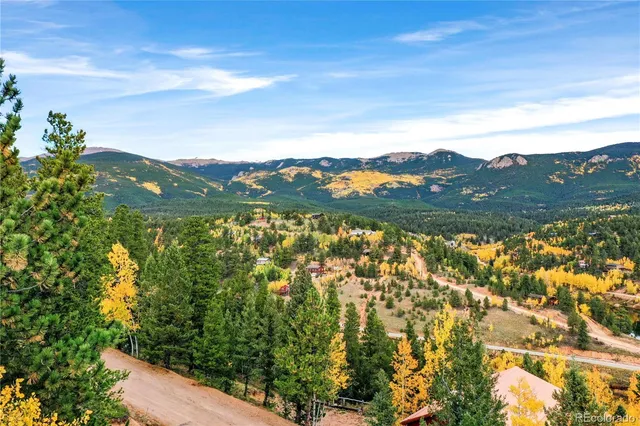 a view of mountain with lake