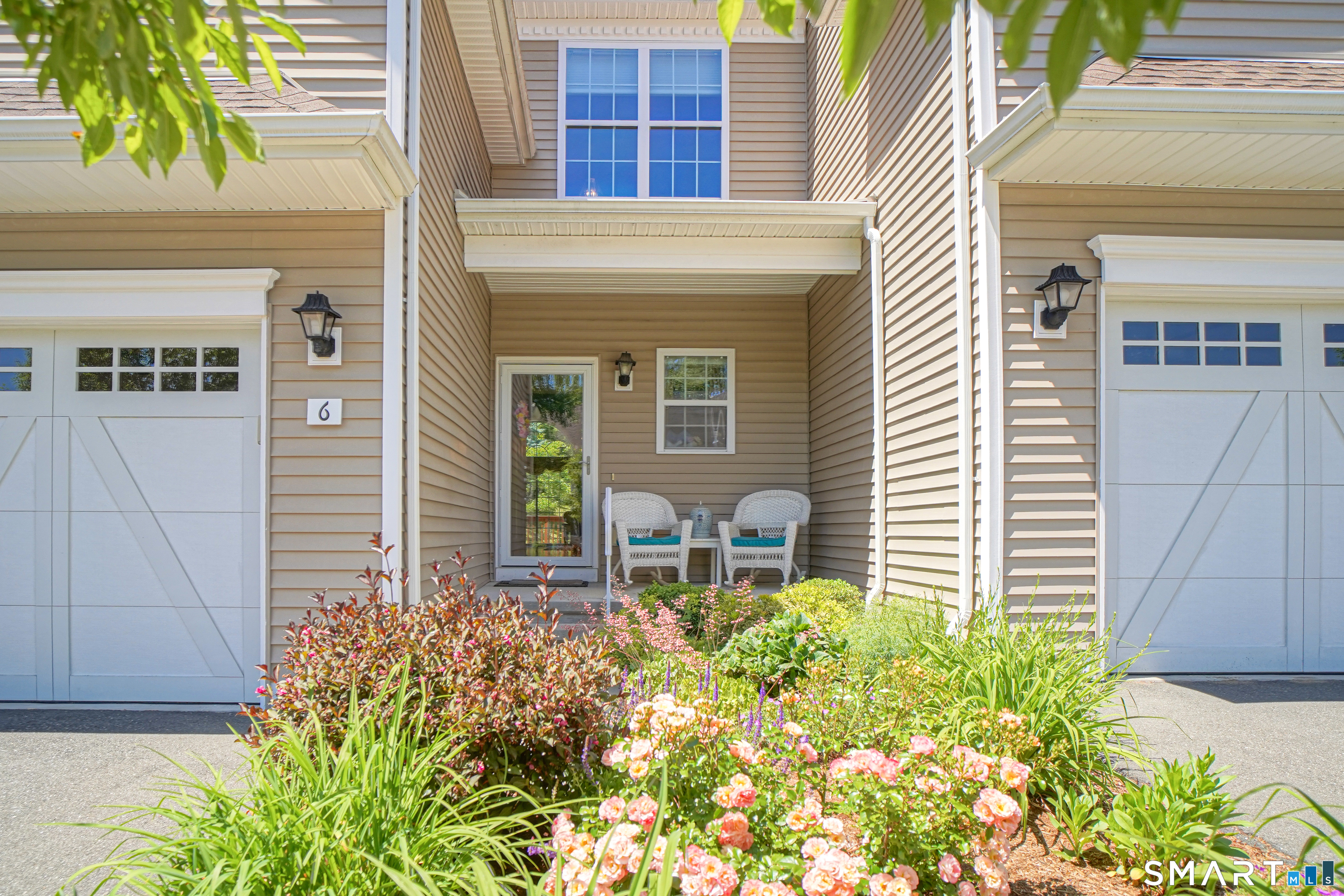 6 Lilac Lane, Unit 6 Prospect, CT 06712 - Photo 9 of 40 Enjoy sitting on your front porch with views of summer flowers.