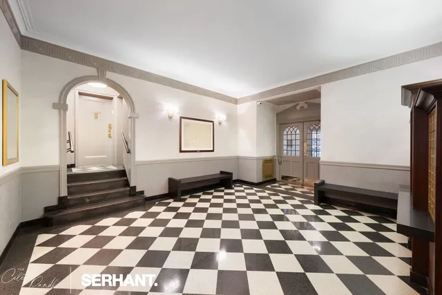 a view of empty room with windows