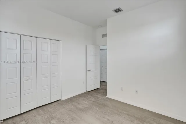 a bathroom with a bathtub and toilet