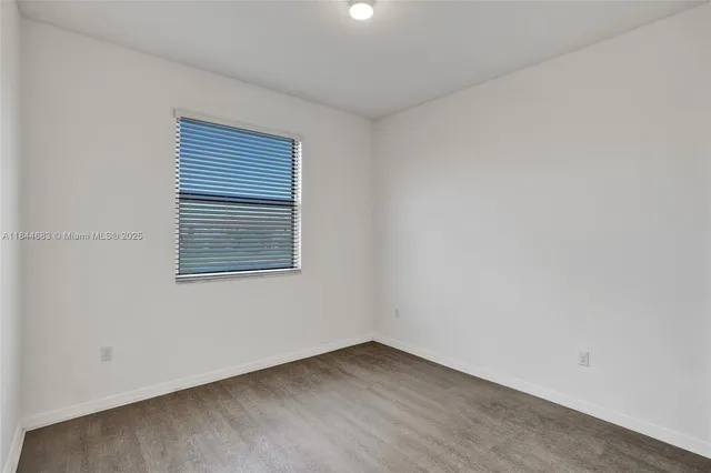 a view of front door and yard