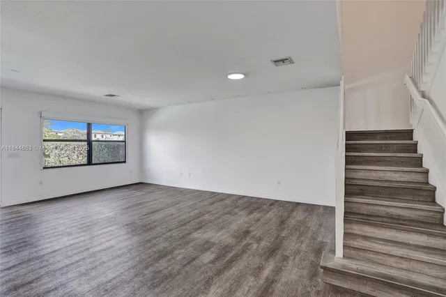 an empty room with window