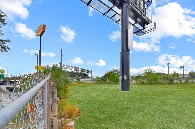 a view of a garden from a balcony