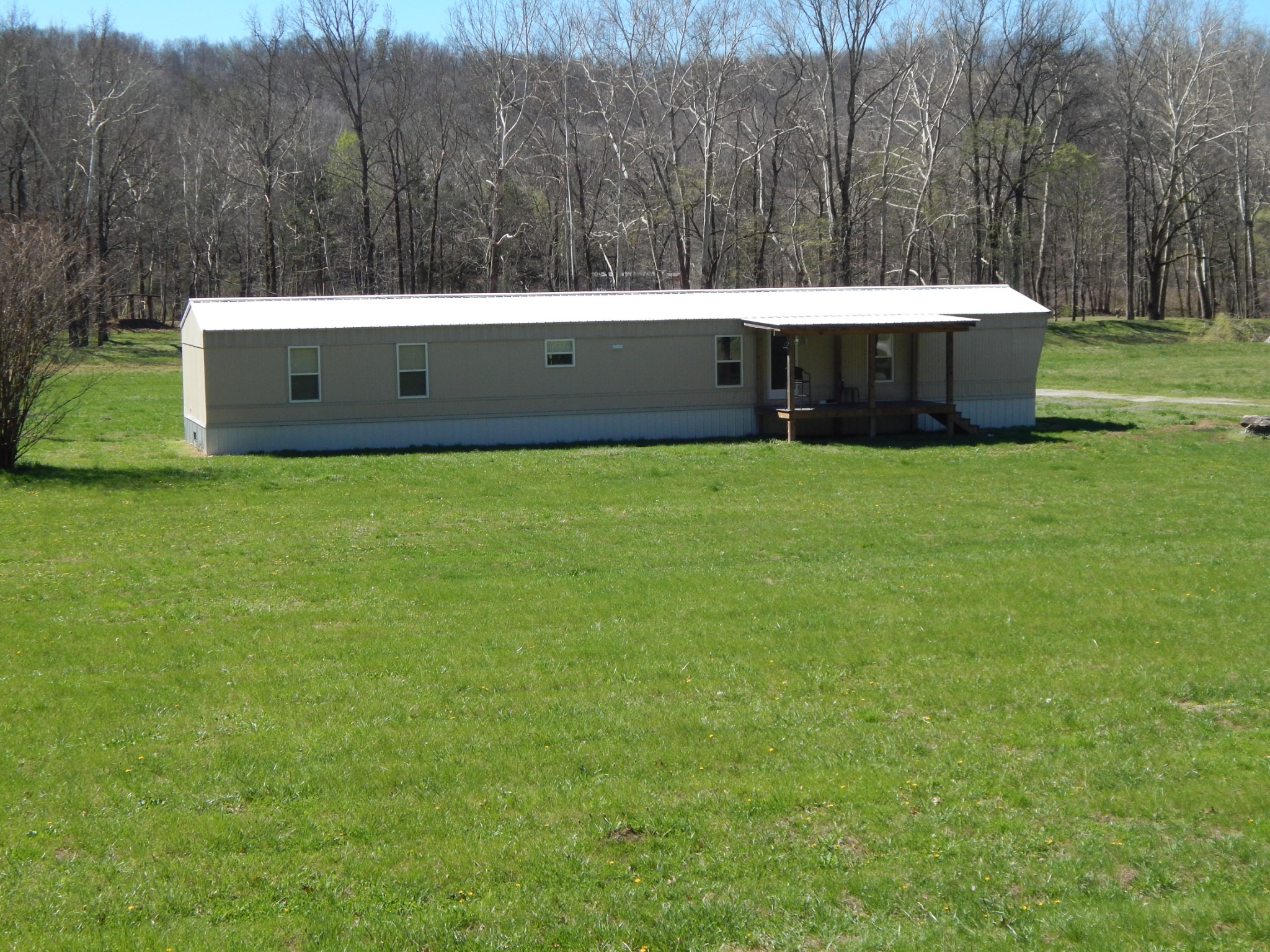 6223 Beech Creek Road Clifton, TN 38425 - Photo 1 of 68 a view of a backyard