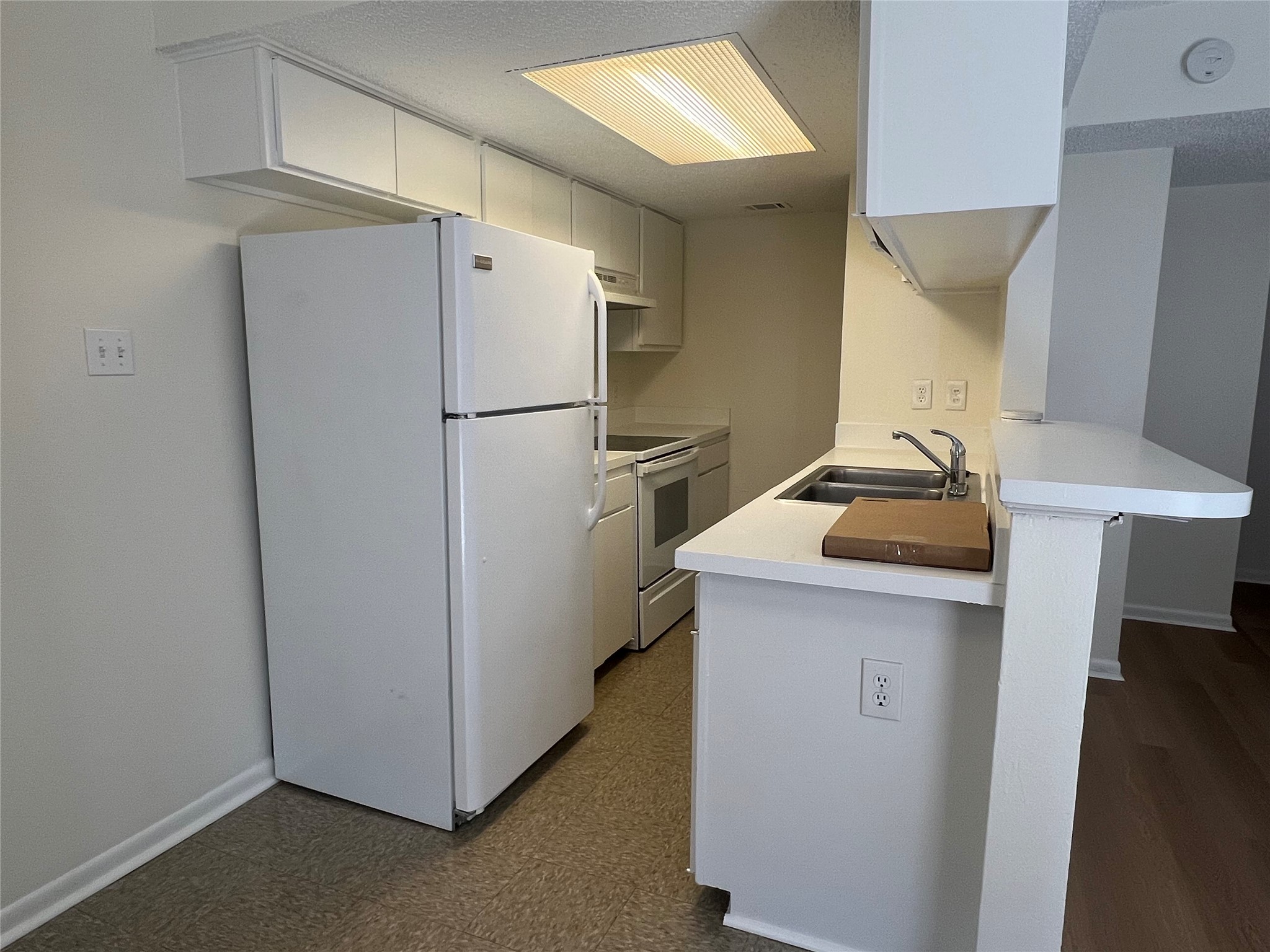 1410 West N Loop Boulevard, Unit 102 Austin, TX 78756 - Photo 14 of 24 a utility room with cabinets washer and dryer