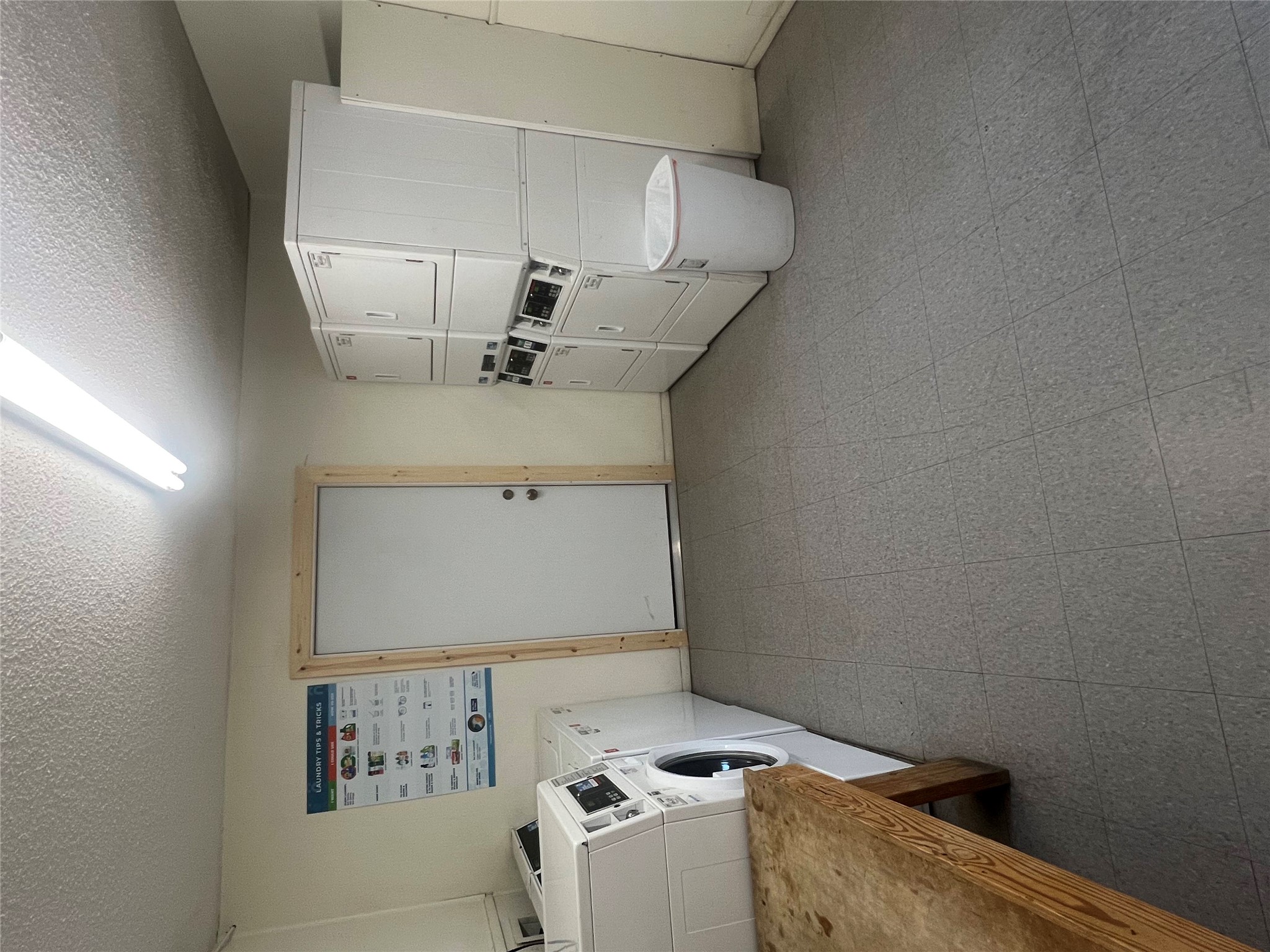 1410 West N Loop Boulevard, Unit 102 Austin, TX 78756 - Photo 24 of 24 a bed room with a bed and a couch