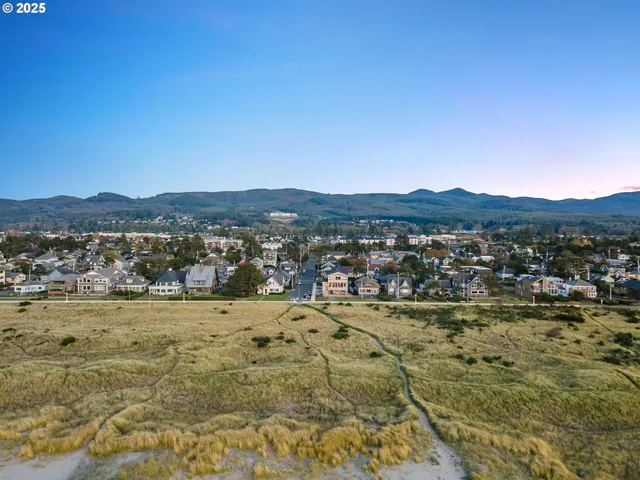 a view of mountain with lake view