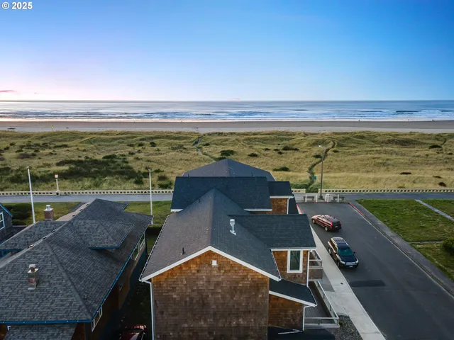 a view of a balcony with an ocean