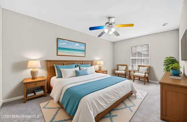 a bathroom with a bath tub with a shower