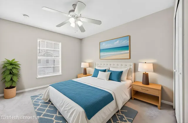 a bedroom with a bed and a couch