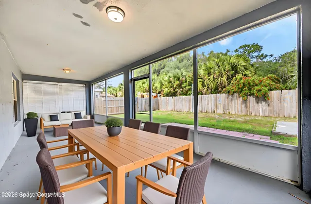 a view of a livingroom with furniture and wooden floor