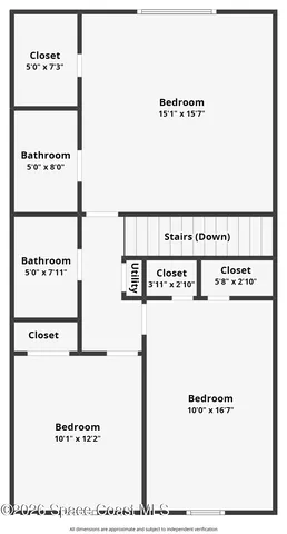 an aerial view of a house with garden space and lake view