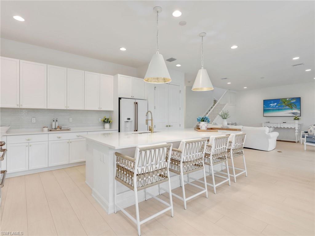 20581 Fair Oak Lane Estero, FL 33928 - Photo 5 of 46 Open Floorplan to Living & Dining Areas