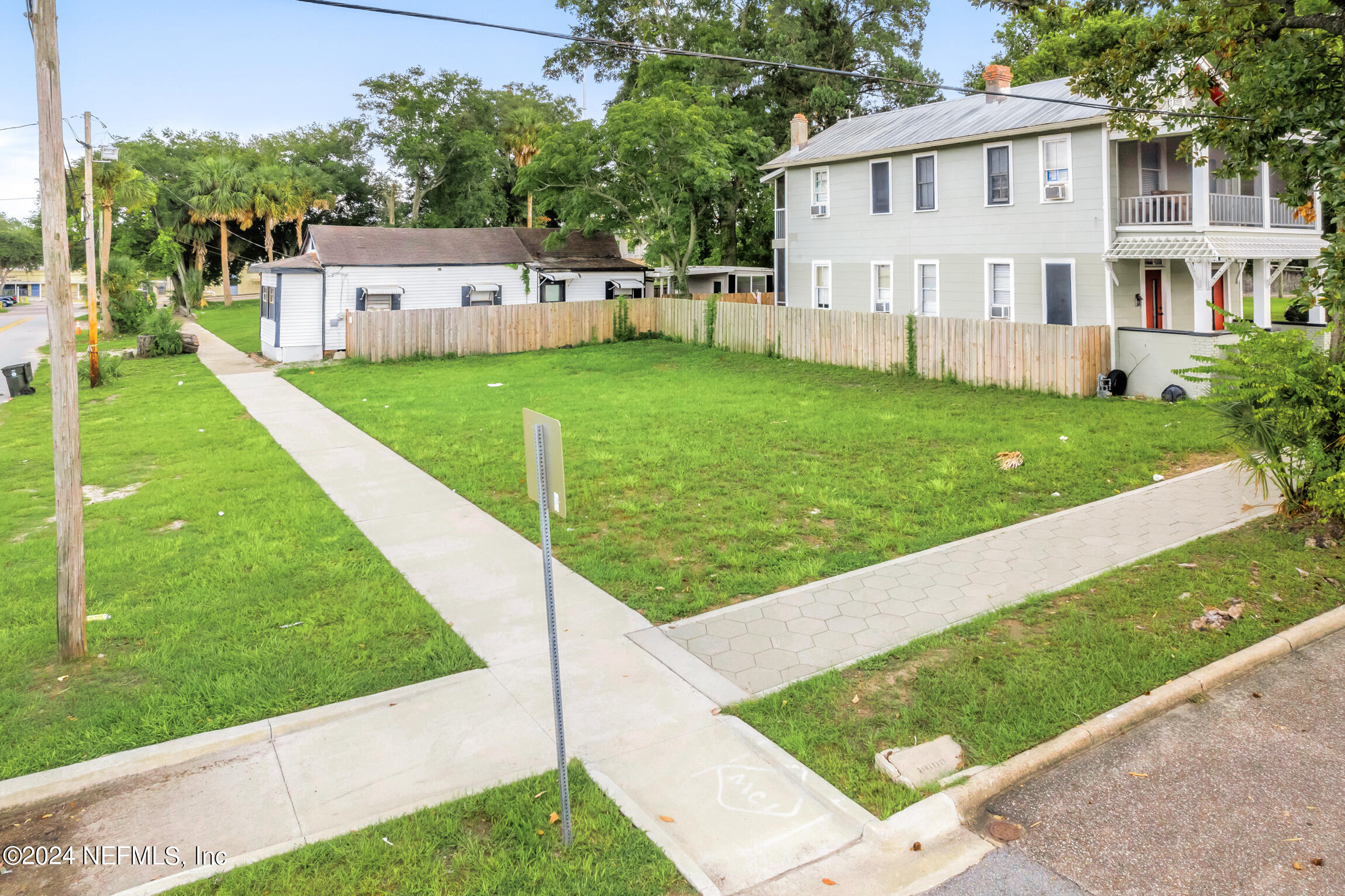 421 North Washington Street Jacksonville, FL 32202 - Photo 3 of 16 a view of a house with a yard and sitting area