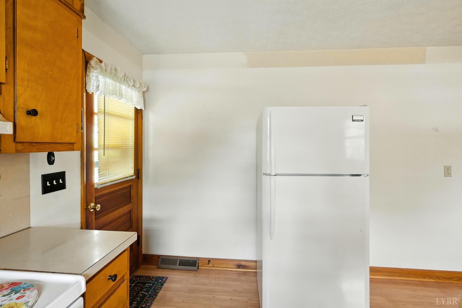 112 Hillside Road Hurt, VA 24563 - Photo 12 of 39 a view of walk in closet with empty racks