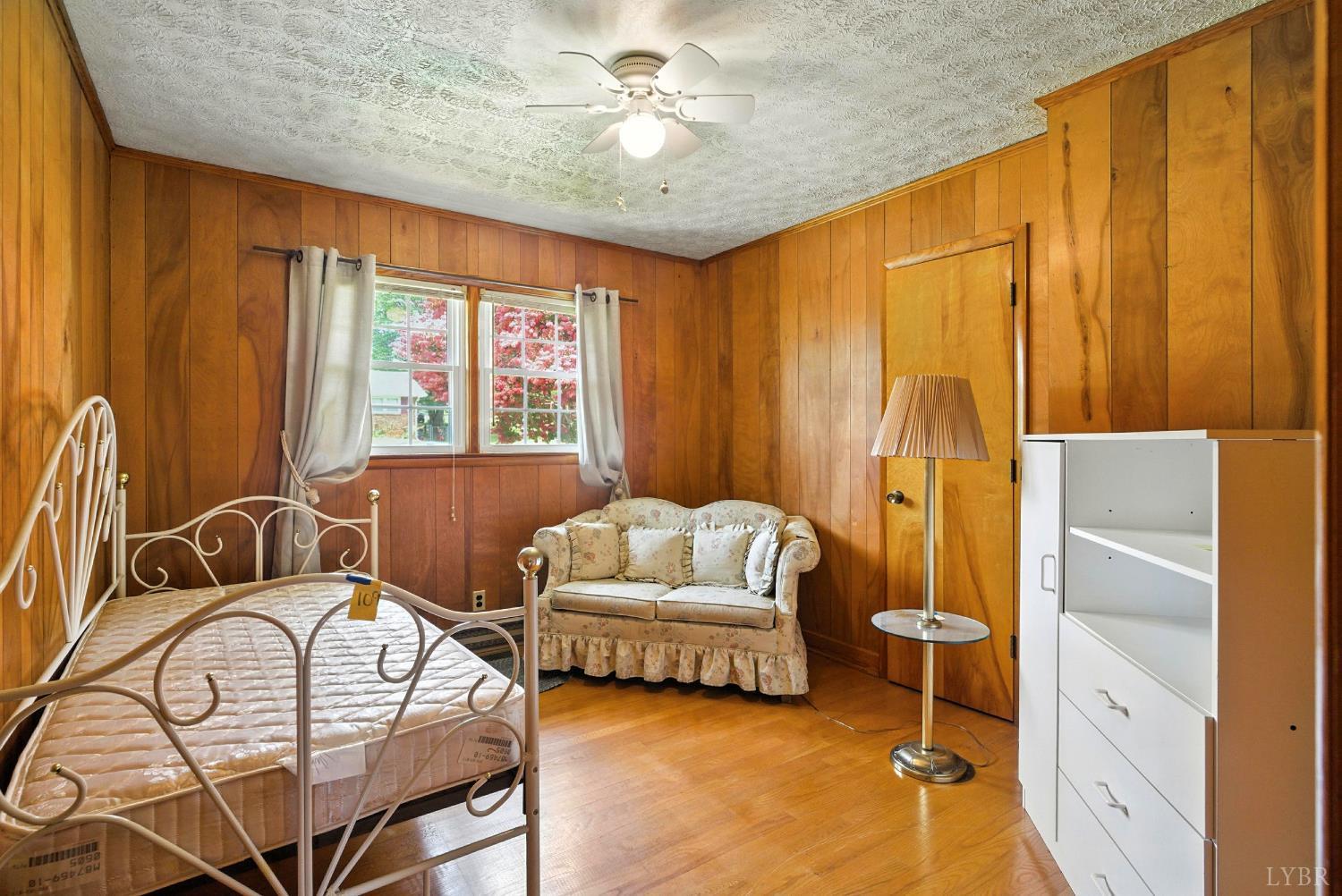 112 Hillside Road Hurt, VA 24563 - Photo 14 of 39 a bedroom with furniture and a window