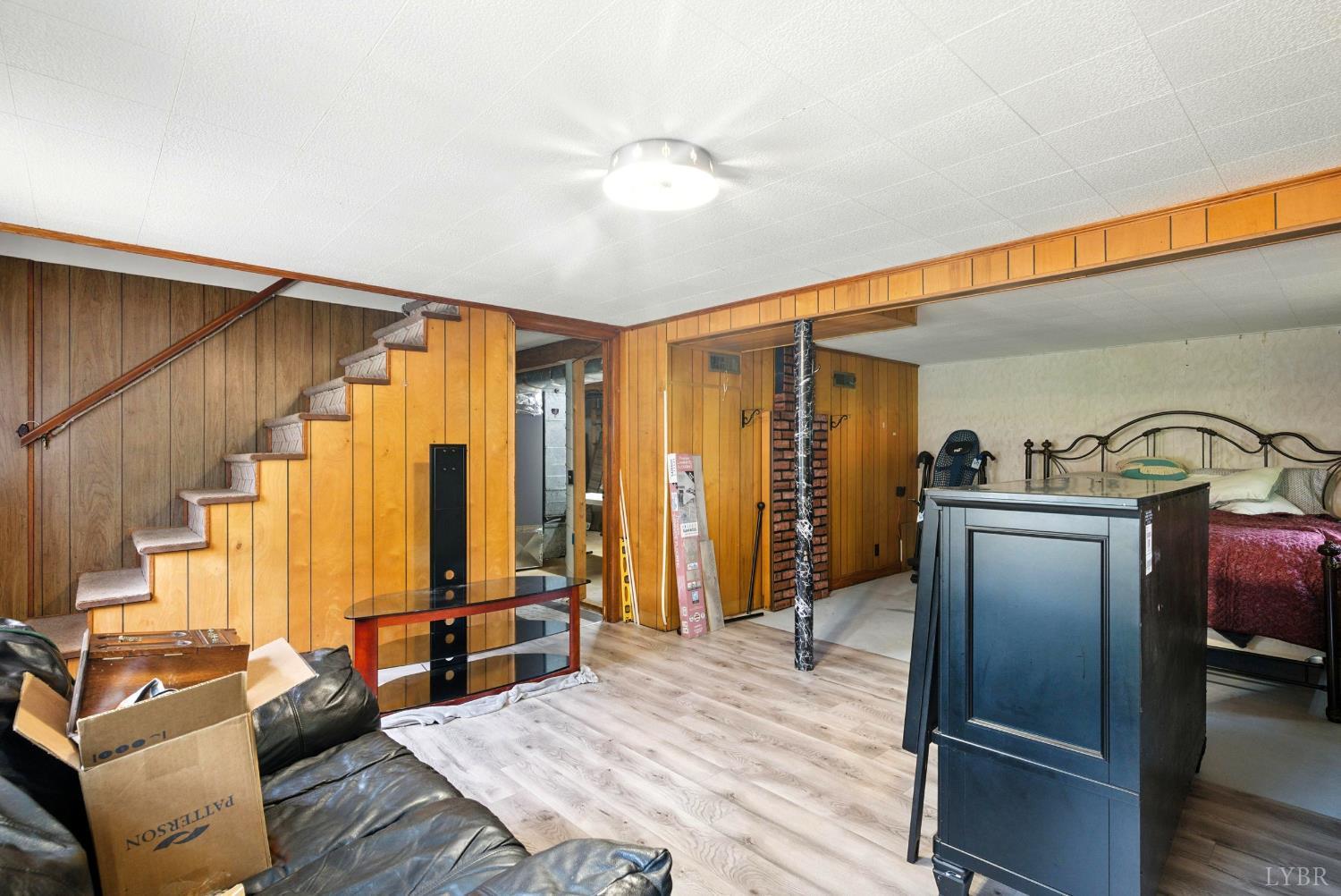 112 Hillside Road Hurt, VA 24563 - Photo 21 of 39 a bedroom with furniture and wooden floor