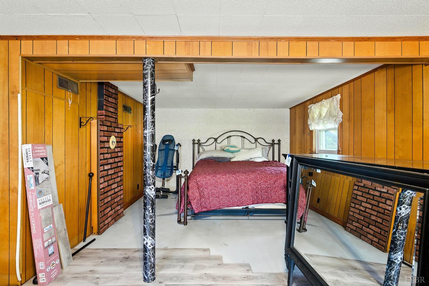 112 Hillside Road Hurt, VA 24563 - Photo 22 of 39 a bedroom with a bed and a window