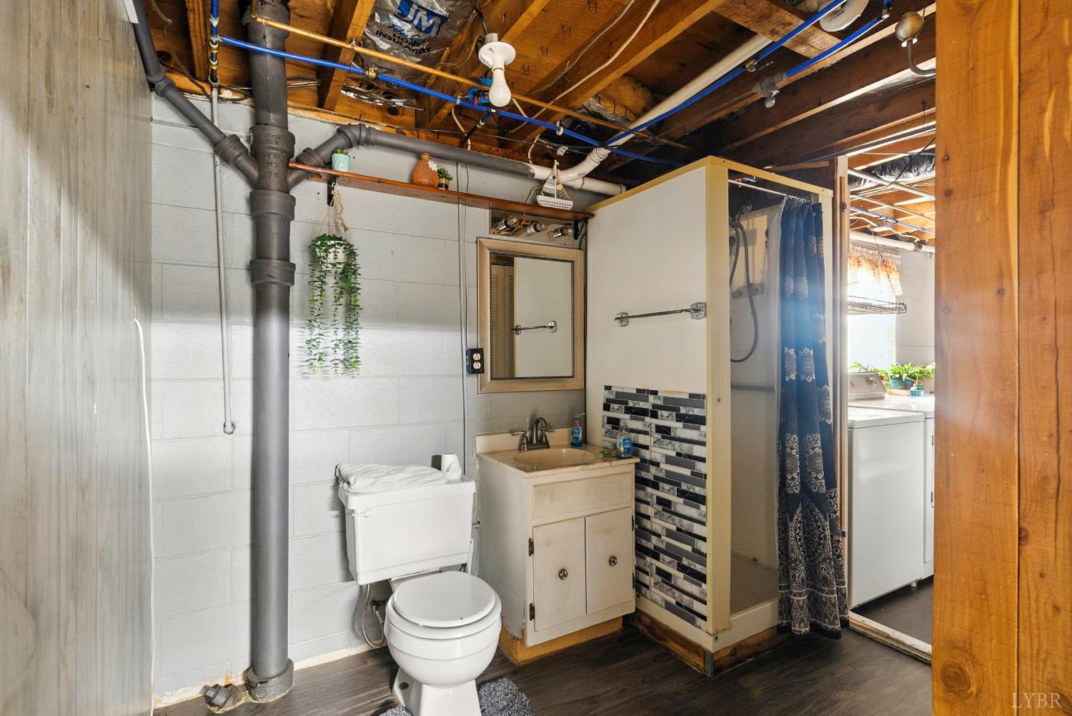 112 Hillside Road Hurt, VA 24563 - Photo 24 of 39 a bathroom with a sink toilet and shower