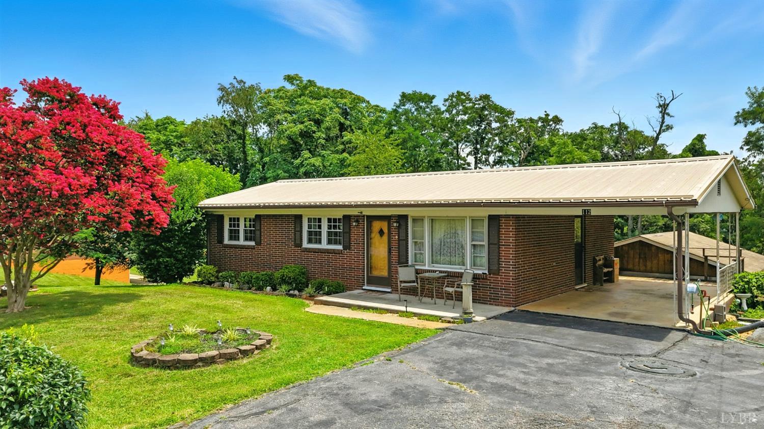112 Hillside Road Hurt, VA 24563 - Photo 29 of 39 a view of a house with backyard and sitting area