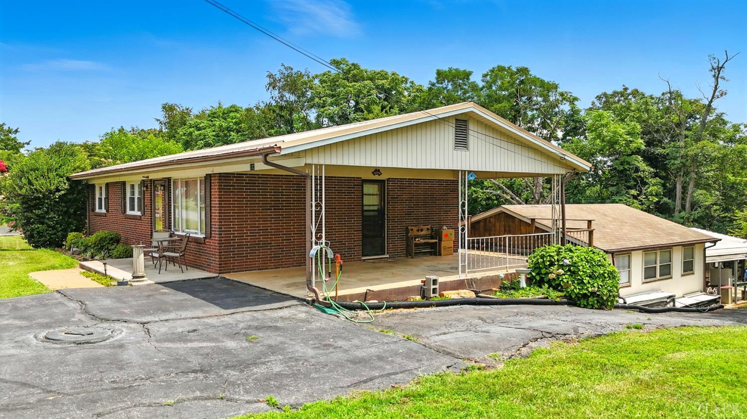 112 Hillside Road Hurt, VA 24563 - Photo 31 of 39 a view of a house with backyard and garden