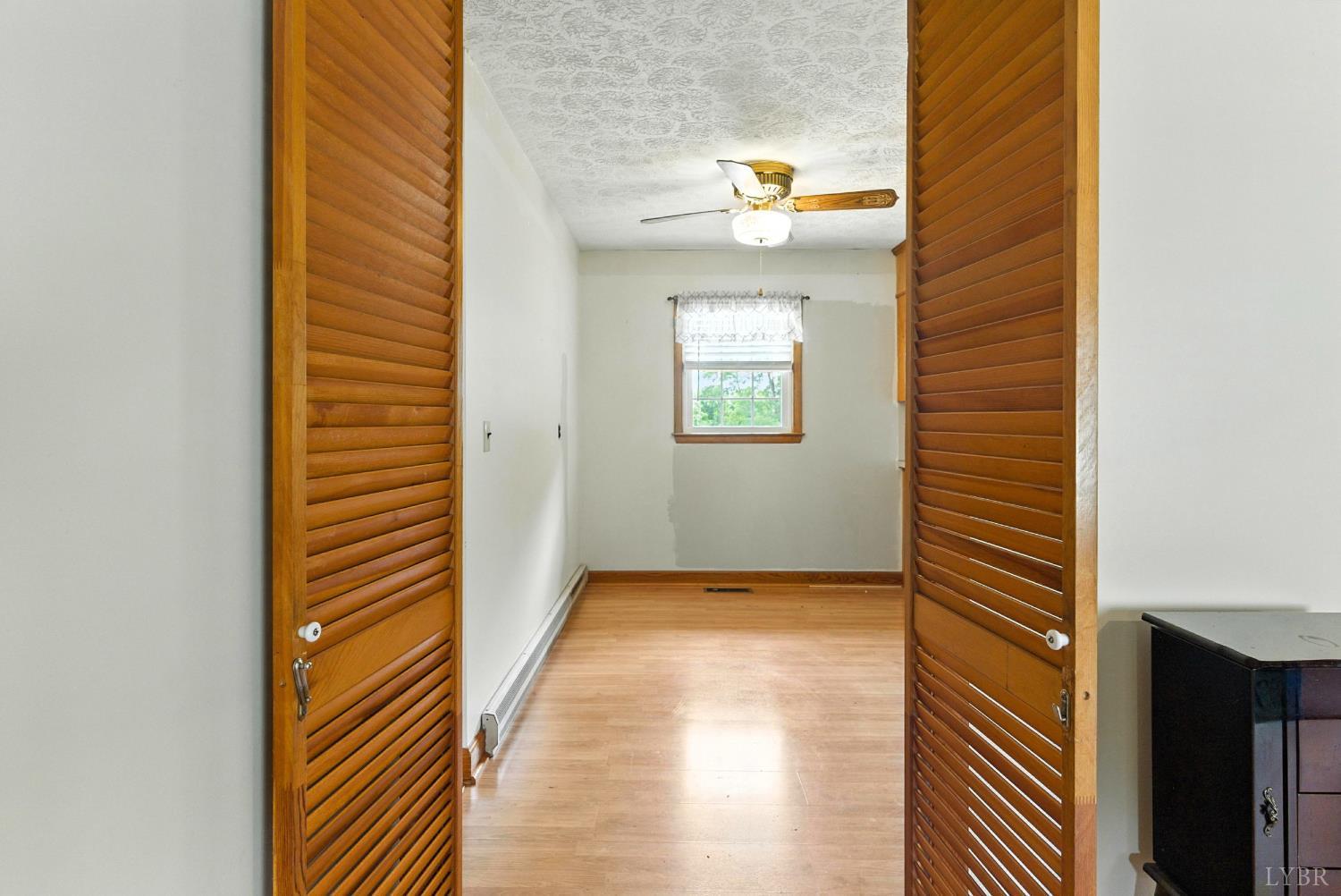 112 Hillside Road Hurt, VA 24563 - Photo 5 of 39 a view of a hallway with windows