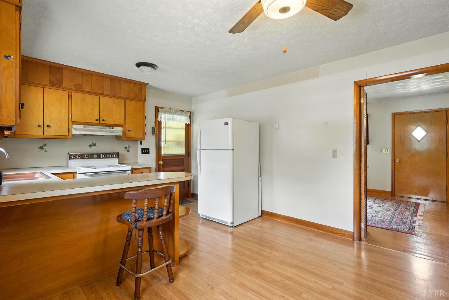 112 Hillside Road Hurt, VA 24563 - Photo 8 of 39 a kitchen with stainless steel appliances granite countertop a refrigerator and a stove top oven