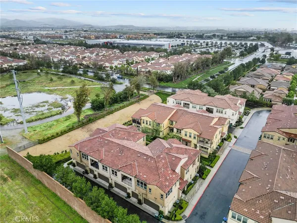 an aerial view of a house with a garden