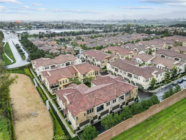 an aerial view of a house with a garden