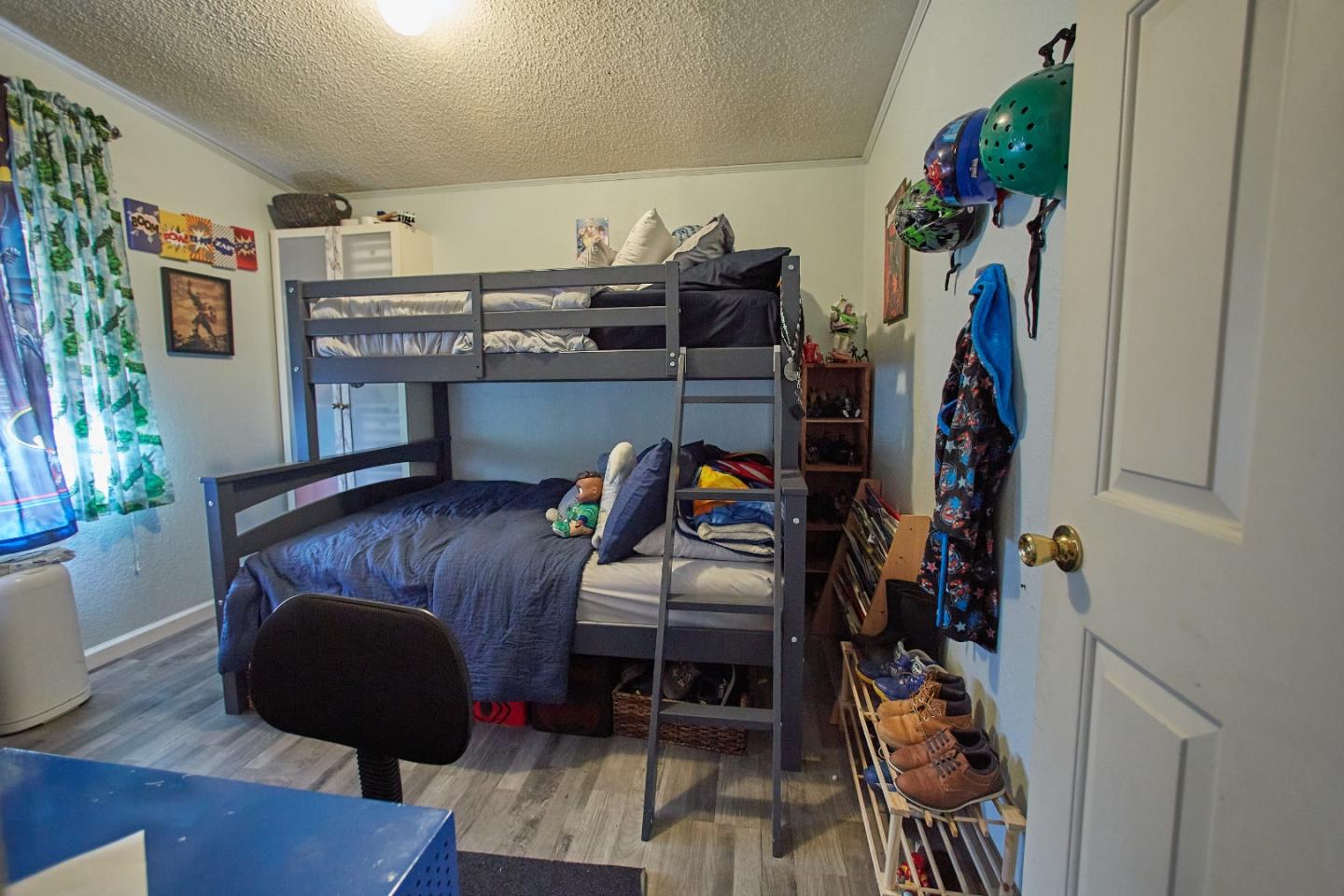 20 Russell Road, Unit 9 Salinas, CA 93906 - Photo 13 of 25 a bedroom with furniture and a bed