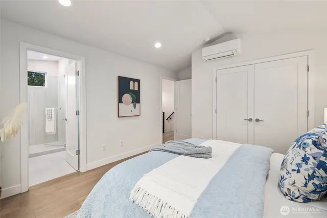 a bathroom with a double vanity sink mirror and