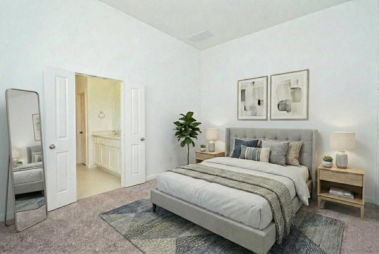 5115 Murillo Drive Manvel, TX 77578 - Photo 15 of 31 a bedroom with a large bed and a chandelier