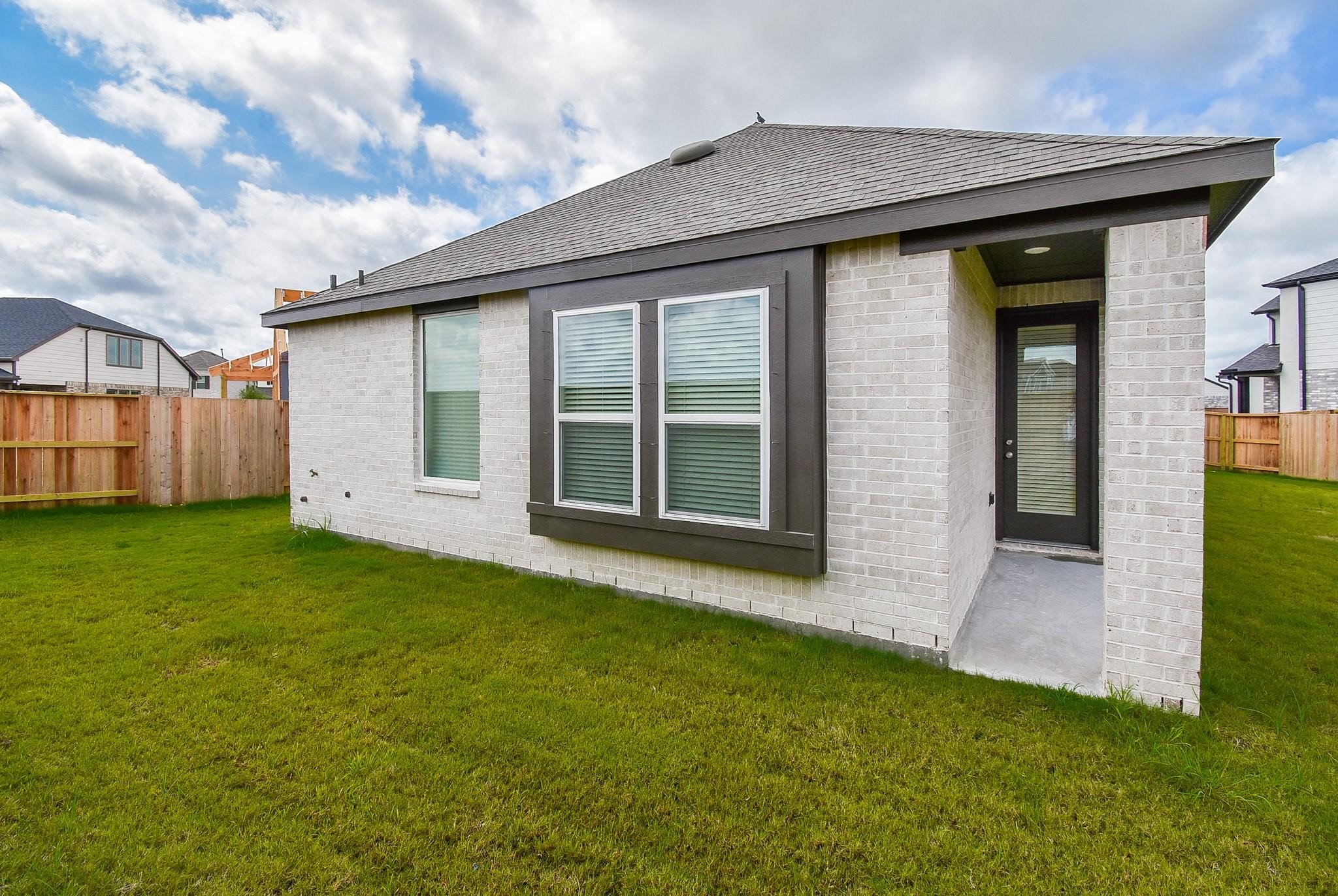 5115 Murillo Drive Manvel, TX 77578 - Photo 29 of 31 a view of a house with a garden