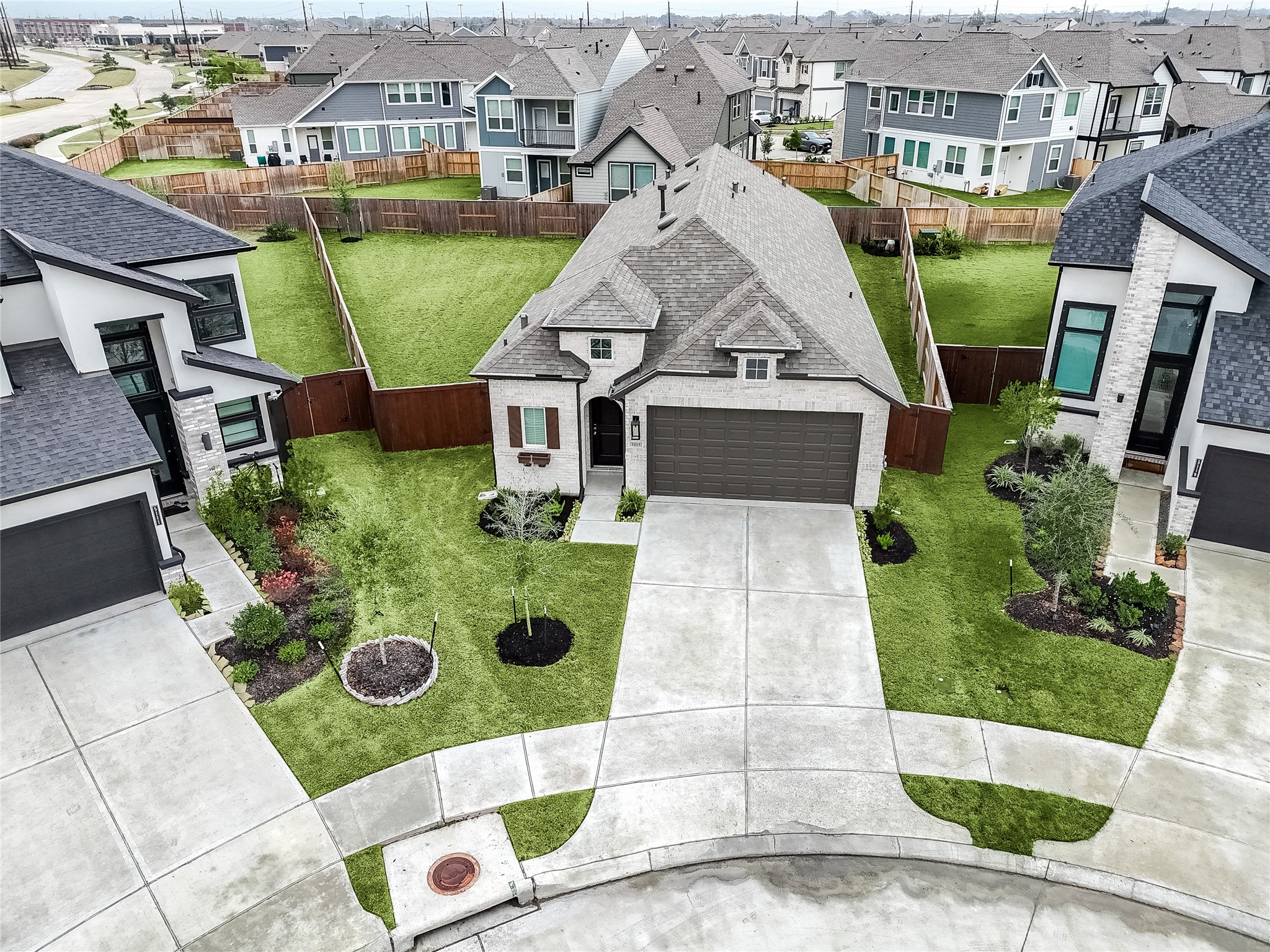 5115 Murillo Drive Manvel, TX 77578 - Photo 3 of 31 Aerial perspective capturing the impressive cul-de-sac setting and oversized lot, a rare find in Meridiana.