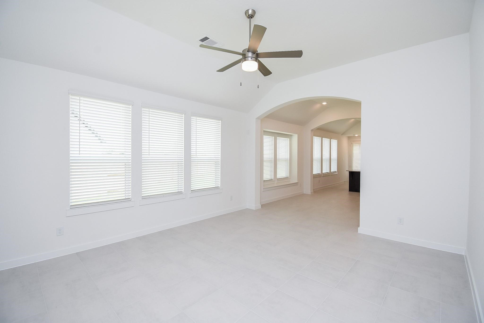 5115 Murillo Drive Manvel, TX 77578 - Photo 7 of 31 a view of an empty room with a window