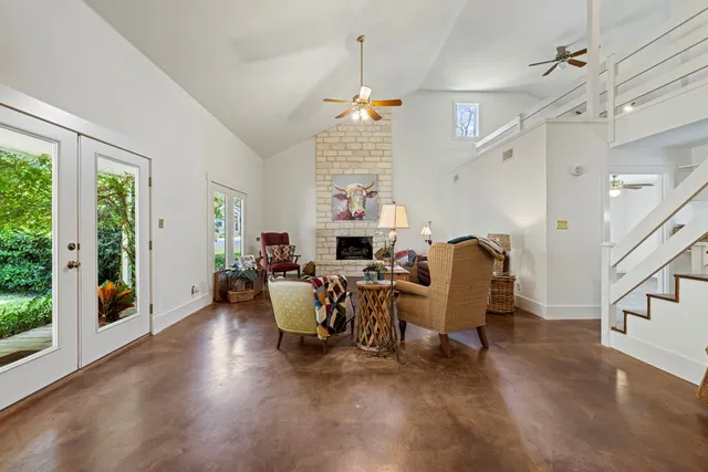 a dining room with furniture window and wooden floor