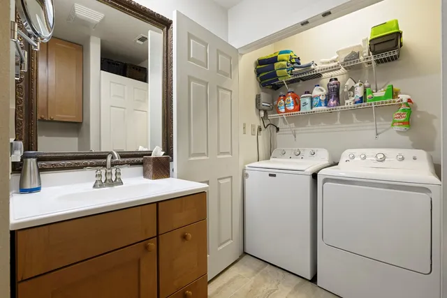 a utility room with dryer and washer