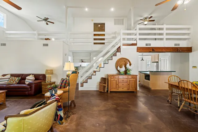 a living room with furniture and a window