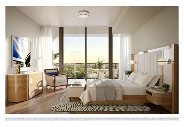 a living room with furniture large window and a table