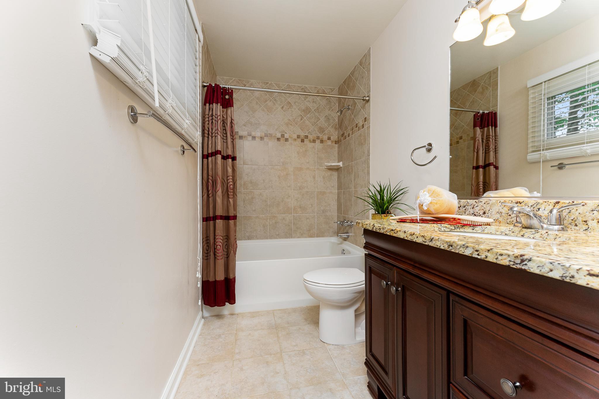 100 East Poplar Road Sterling, VA 20164 - Photo 13 of 23 Full bath, master bedroom