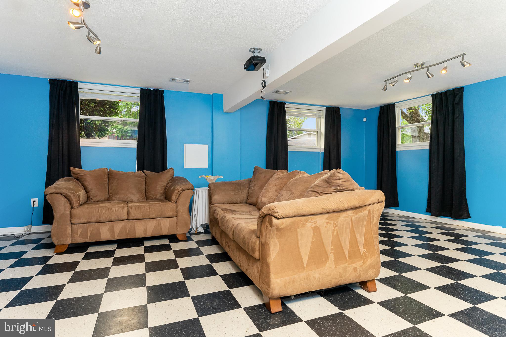 100 East Poplar Road Sterling, VA 20164 - Photo 18 of 23 Den/?? with awesome checker board floor!