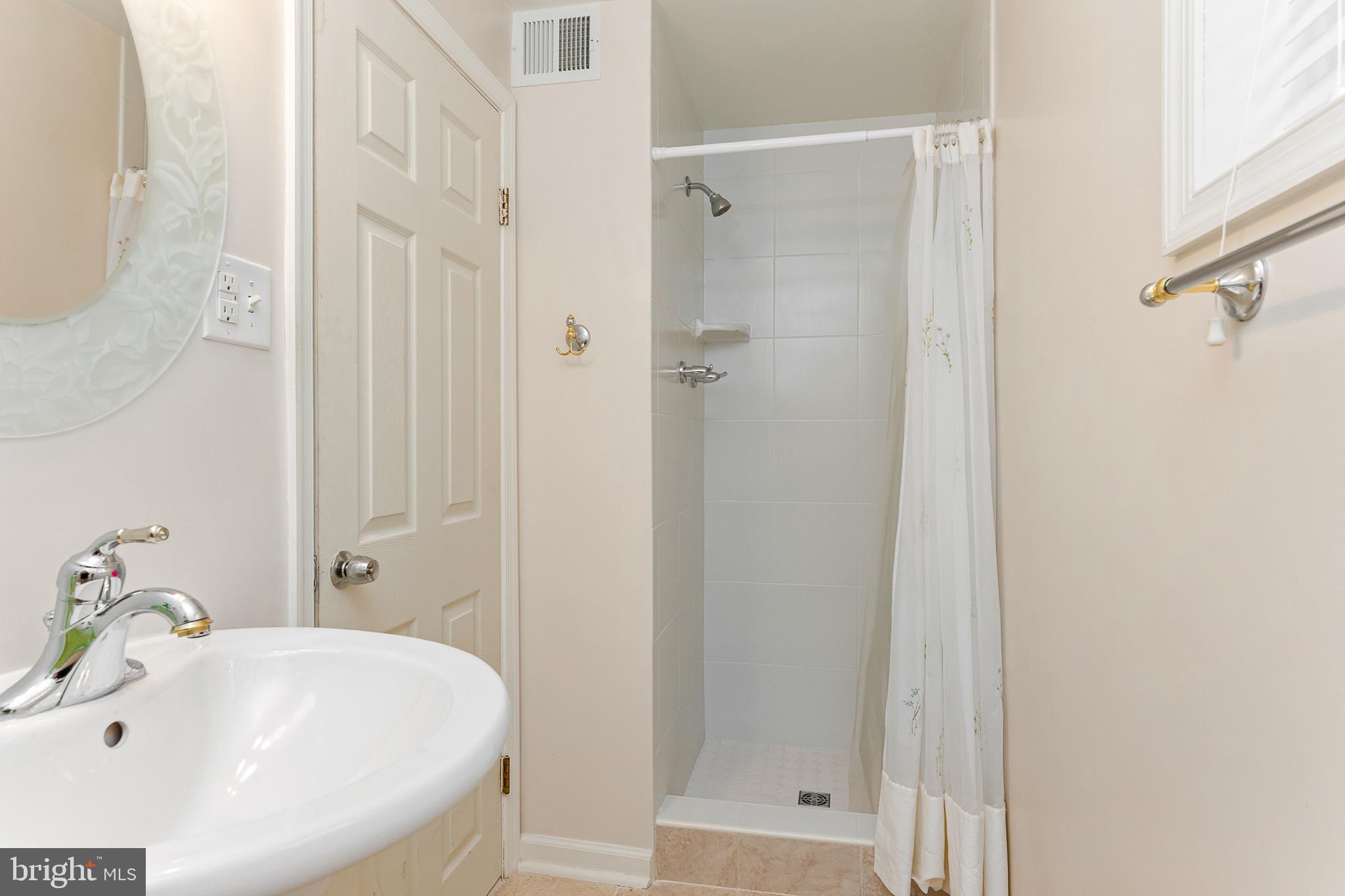 100 East Poplar Road Sterling, VA 20164 - Photo 21 of 23 Full bath in basement level