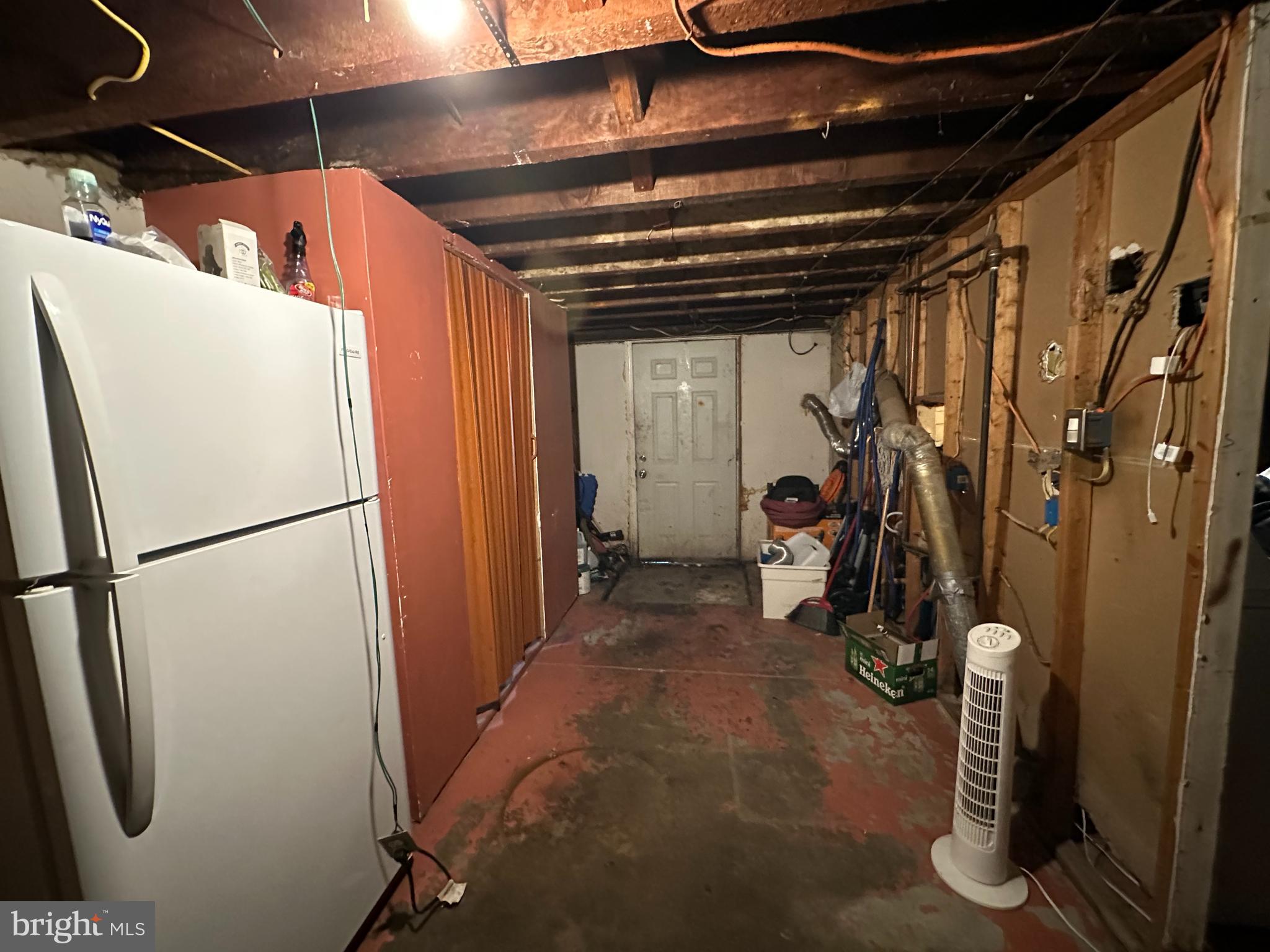 7143 Jackson Street Philadelphia, PA 19135 - Photo 21 of 23 a view of a storage and utility room with refrigerator