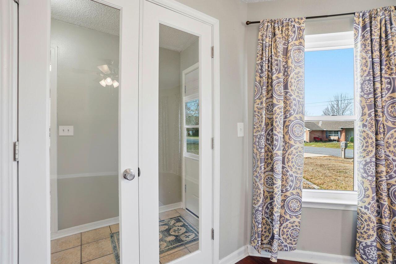 1285 Jefferyscot Drive Crestview, FL 32536 - Photo 19 of 41 a bathroom with a window and a shower