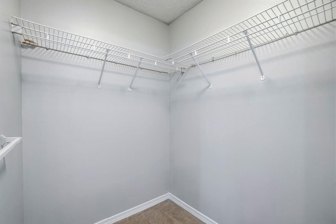 1285 Jefferyscot Drive Crestview, FL 32536 - Photo 27 of 41 a view of a room with racks on the wall