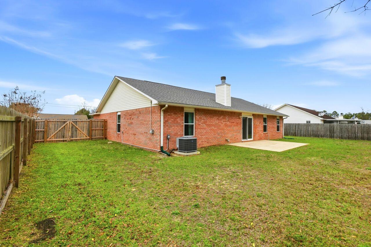 1285 Jefferyscot Drive Crestview, FL 32536 - Photo 33 of 41 a view of a house with backyard