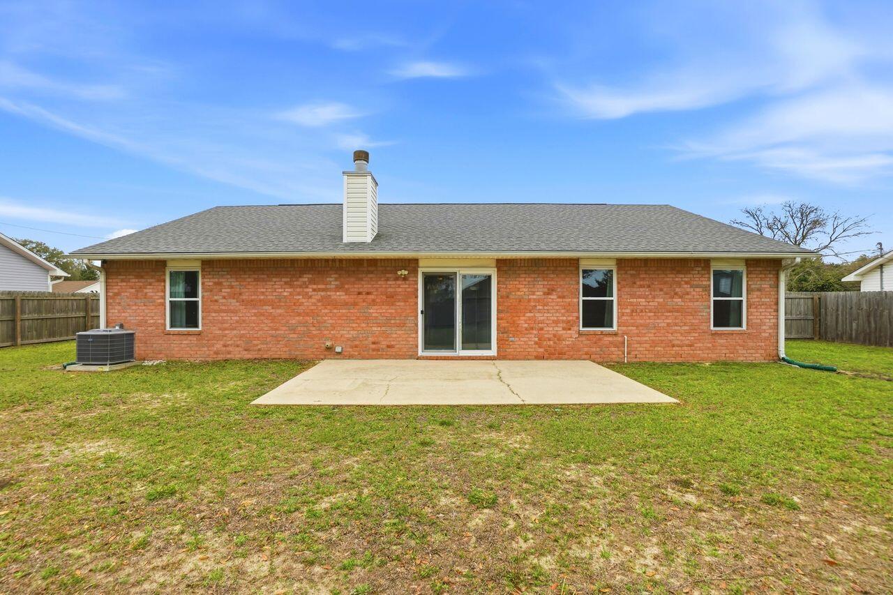 1285 Jefferyscot Drive Crestview, FL 32536 - Photo 34 of 41 a front view of house with yard and trees