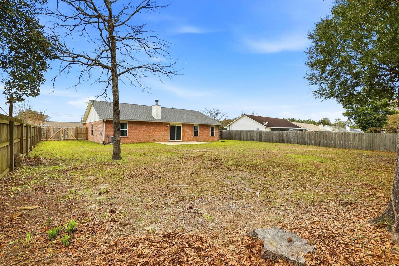 1285 Jefferyscot Drive Crestview, FL 32536 - Photo 39 of 41 a front view of a house with a yard