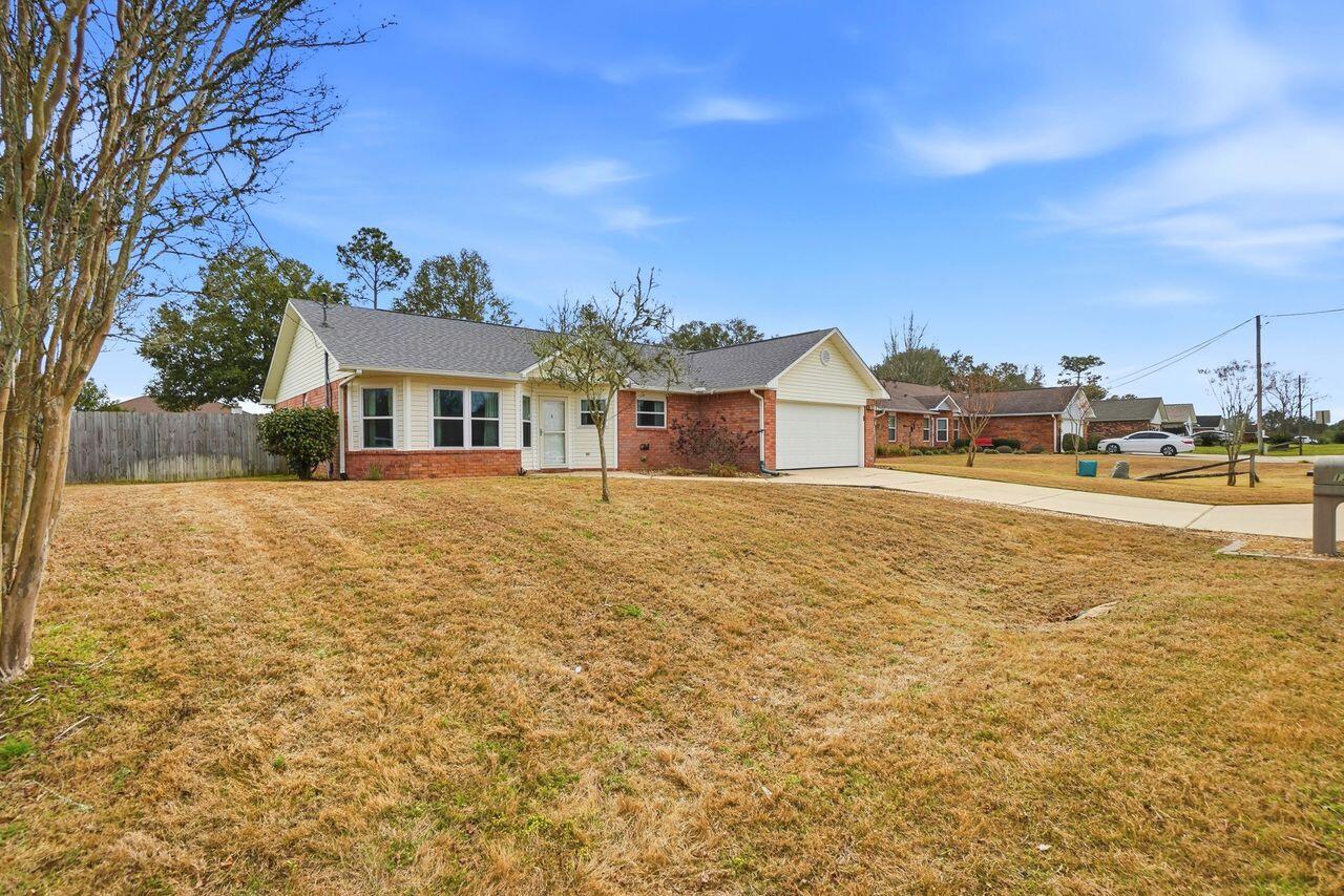 1285 Jefferyscot Drive Crestview, FL 32536 - Photo 4 of 41 a view of a house with a outdoor space
